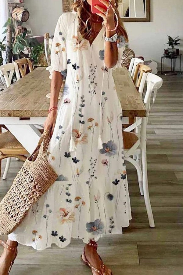 Florencie | Dámské Boho květinové maxi šaty s krátkým rukávem" can be rewritten as:

"Florencie | Dámské Boho maxi šaty s květinovým vzorem a krátkým rukávem
